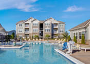 Thumbnail 30 of 32 - Resort-style Swimming Pool and Deck