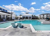 Thumbnail 1 of 30 - Resort-style Swimming Pool and Deck