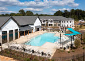 Thumbnail 6 of 13 - Resort-style Swimming Pool and Deck