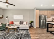 Thumbnail 4 of 24 - Kitchen and Living Room