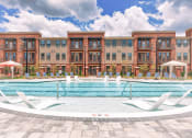 Thumbnail 3 of 24 - Resort-style Swimming Pool and Deck