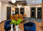Thumbnail 18 of 21 - Business center with private focus rooms and collaborative workspace at Argento on the Broad apartments in Arden, NC