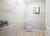 Thumbnail 12 of 21 - Walk-in Closet