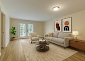 Thumbnail 3 of 16 - A living room with a grey couch, a chair, a coffee table, and two framed pictures on the wall.