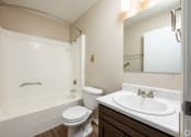 Thumbnail 3 of 18 - the preserve at ballantyne commons apartment bathroom with sink toilet and shower