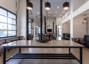 Thumbnail 9 of 9 - a conference room with a glass table and chairs