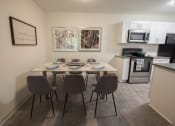 Thumbnail 6 of 9 - Kitchen and Dining Area