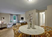 Thumbnail 11 of 22 - Living Room and Dining Area