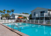 Thumbnail 5 of 13 - Resort-style Swimming Pool and Deck