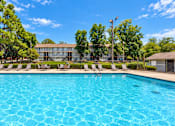 Thumbnail 11 of 15 - Swimming pool at Madison Park Apartments & Townhomes in Birmingham, Alabama.