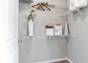 Thumbnail 32 of 34 - Walk-in Closet