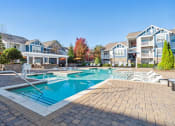 Thumbnail 1 of 34 - Resort-style Swimming Pool and Deck