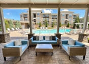 Thumbnail 3 of 17 - Resort-style Swimming Pool and Deck