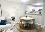 Thumbnail 9 of 24 - Living Room, Dining Area, and Kitchen