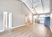 Thumbnail 7 of 16 - Living Room and Kitchen