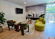 Thumbnail 5 of 57 - A living room with a surfer mural on the wall.
