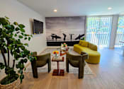 Thumbnail 3 of 57 - A living room with a surfboard mural on the wall.