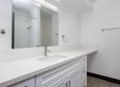 Thumbnail 46 of 52 - an empty bathroom with a sink and a mirror