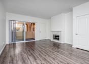 Thumbnail 34 of 34 - a bedroom with hardwood floors and white walls