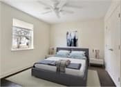 Thumbnail 4 of 4 - A bedroom with a bed and a ceiling fan.