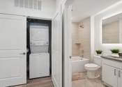 Thumbnail 10 of 24 - Bathroom with a washer and dryer at The Anchorage on Kelly, East Falls, Pennsylvania