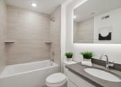 Thumbnail 7 of 24 - Bathroom with a sink toilet and bathtub  at The Anchorage on Kelly, East Falls, Pennsylvania