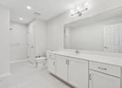 Thumbnail 16 of 18 - White Bathroom at Roosevelt Commons Apartments, Philadelphia