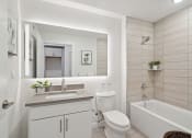 Thumbnail 15 of 24 - Bathroom with a sink toilet and a mirror  at The Anchorage on Kelly, Philadelphia