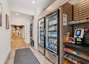 Thumbnail 34 of 57 - A modern vending machine with a variety of drinks and snacks.