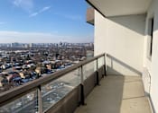 Thumbnail 12 of 20 - a view from a balcony on a skyscraper