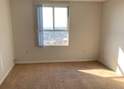 Thumbnail 15 of 20 - an empty room with a window in it