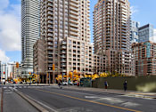 Thumbnail 21 of 24 - Two tall buildings stand next to each other with a street in front of them.