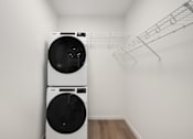 Thumbnail 55 of 61 - A white washing machine and dryer in a small laundry room.