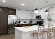Thumbnail 2 of 4 - A modern kitchen with a white island and wooden chairs.
