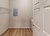 Thumbnail 19 of 19 - A white door is on the right and a white shelf is on the left.
