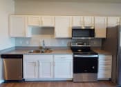 Thumbnail 30 of 33 - Open Concept Kitchen at First Street Lofts in Downtown Bismarck, North Dakota, 58506
