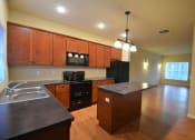 Thumbnail 16 of 26 - The Canterbury | 2 BR | Kitchen | Dining Area | Three Sixty Real Estate