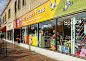 Thumbnail 29 of 36 - Henry Bear's Park storefront with toys and books displayed in the window.