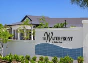 Thumbnail 24 of 43 - the water front sign in front of a house