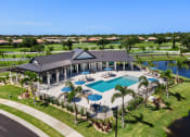 Thumbnail 34 of 43 - an aerial view of the pool and clubhouse at the resort at longboat key club
