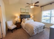 Thumbnail 27 of 34 - Bedroom With Ceiling Fan at The Villas at Nature Walk, Huntsville