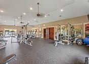 Thumbnail 12 of 34 - A spacious gym with a variety of equipment. at The Villas at Nature Walk, Huntsville, AL, 35824