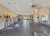 Thumbnail 13 of 34 - A spacious gym with treadmills, elliptical machines, and other exercise equipment. at The Villas at Nature Walk, Huntsville, Alabama