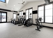 Thumbnail 52 of 52 - A spacious gym with a variety of exercise equipment at Ovation at Town Madison, Madison