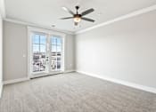 Thumbnail 9 of 28 - Carpeted Living Area at The Lofts at Town Madison, Madison, 35758