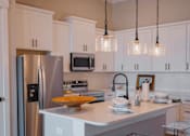 Thumbnail 2 of 28 - Modern Kitchen at The Lofts at Town Madison, Madison, AL, 35758