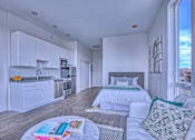 Thumbnail 9 of 18 - Kitchen Come Living Area at Sloan's Place Apartments, Denver, 80214