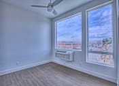 Thumbnail 16 of 18 - Room with a Ceiling Fan at Sloan's Place Apartments, Denver