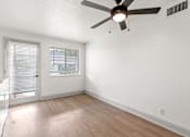 Thumbnail 17 of 19 - the spacious living room of our two bedroom apartment atrium at our community center
