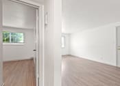 Thumbnail 15 of 19 - the spacious living room and dining room of an apartment
